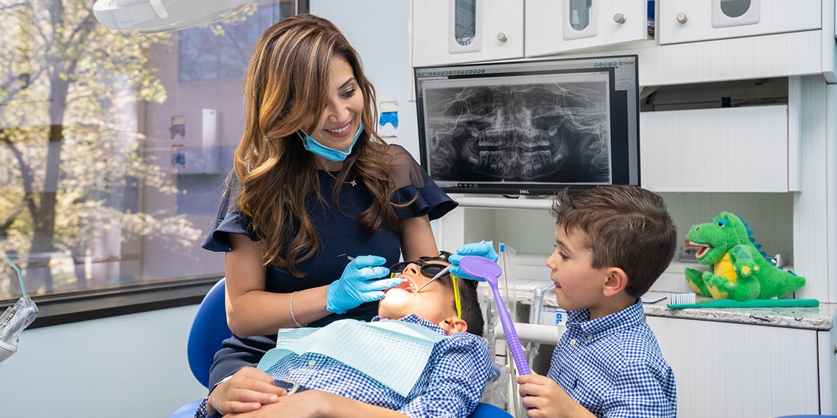 Dr. Jamshidi and sons at dental chair